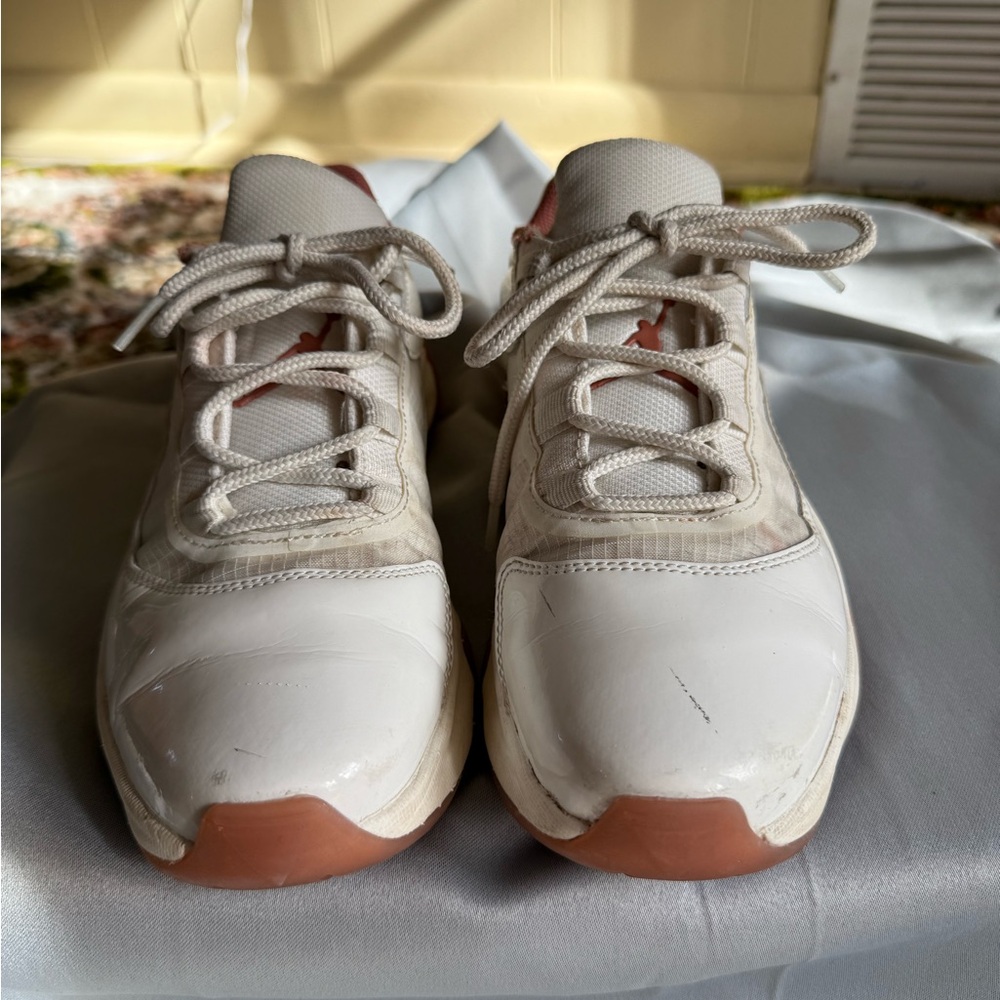 White and Pink Nike Air Jordans